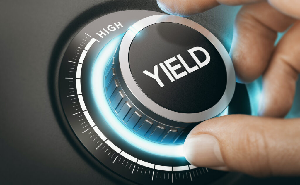 Best dividend stocks: A hand turning a knob to select high yield
